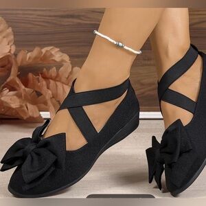 Womens Bow front black flats. New in package.